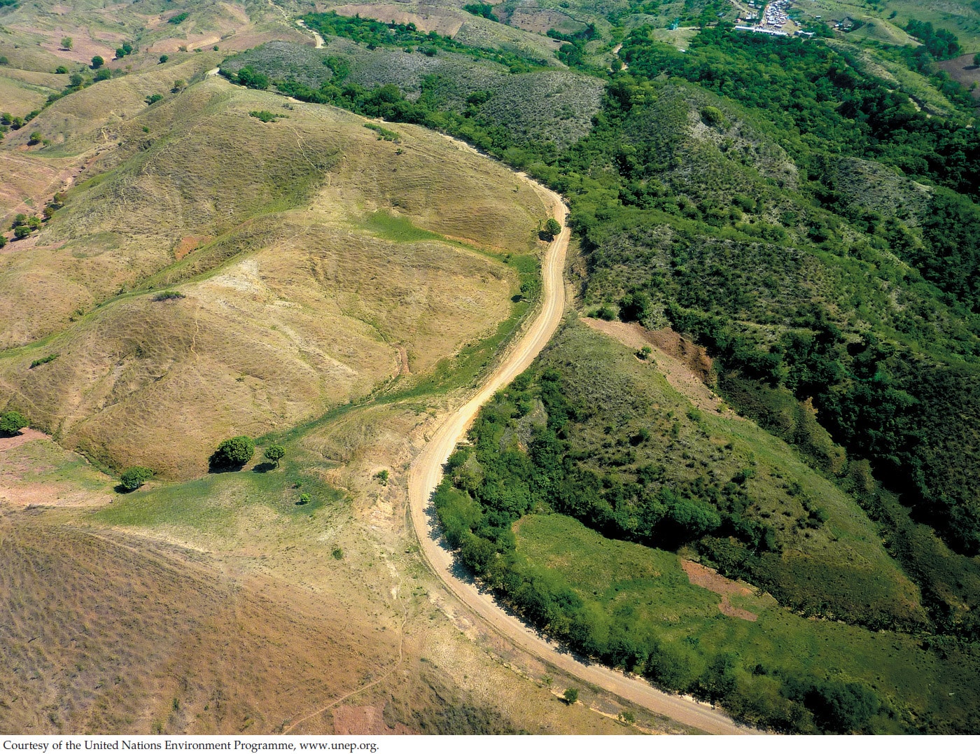 forests in haiti; haiti deforestation; An aerial view of the border between Haiti (left) and the Dominican Republic (right) provides a dramatic illustration of the extent of soil degradation in Haiti