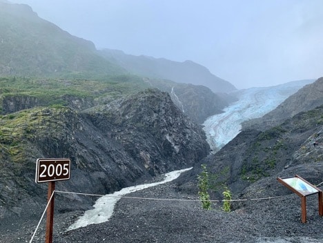 Alaska’s Exit Glacier, a major attraction in Kenai Fjords National Park, serves as a visual indicator of glacial recession due to climate change.