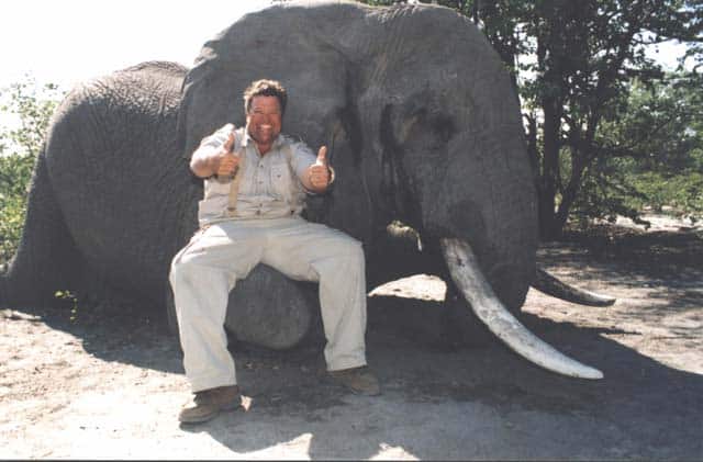 A photo of Jimmy John Liautaud, founder of the fast-food chain Jimmy John’s, posing after legally shooting an elephant in Tanzania.