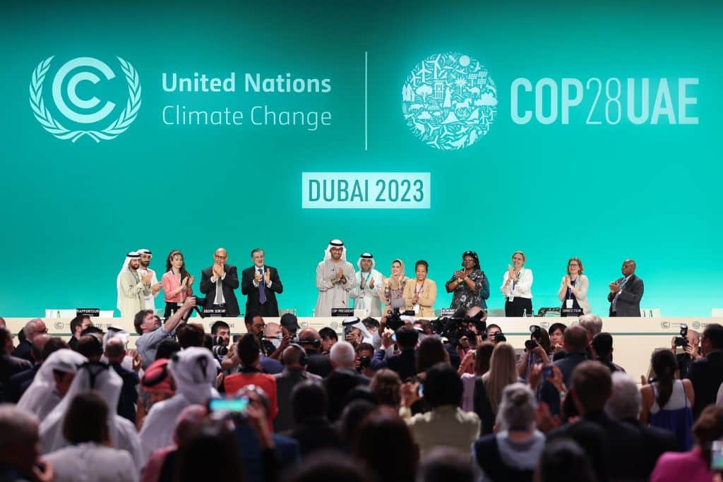COP28 President Sultan Al Jaber and other participants onstage during the COP28 Closing Plenary at COP28 in Dubai on December 13, 2023. UNclimatechange/Flickr