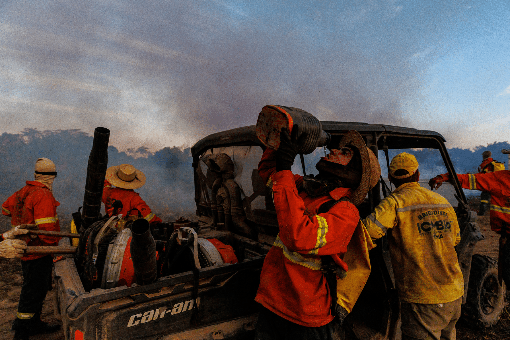 Rescue teams taking a break during the Pantanal wildfires in August 2024.